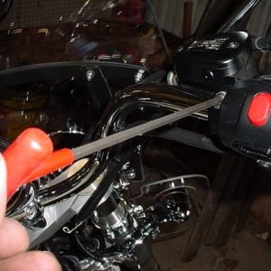 Flipmeister-Loosening switchgear to adjust pressure on throttle