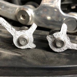 Broken piece of crankcase with bolts