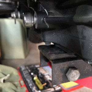 First broken crankcase piece attached with bolt