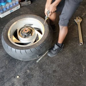 My Son removing the rear tire from the wheel