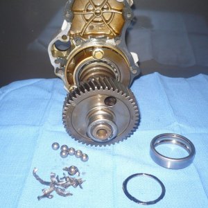 Out drive unit innermost bearing parts with oil shield