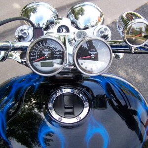 Instrument cluster with small skulls and cool blue paint