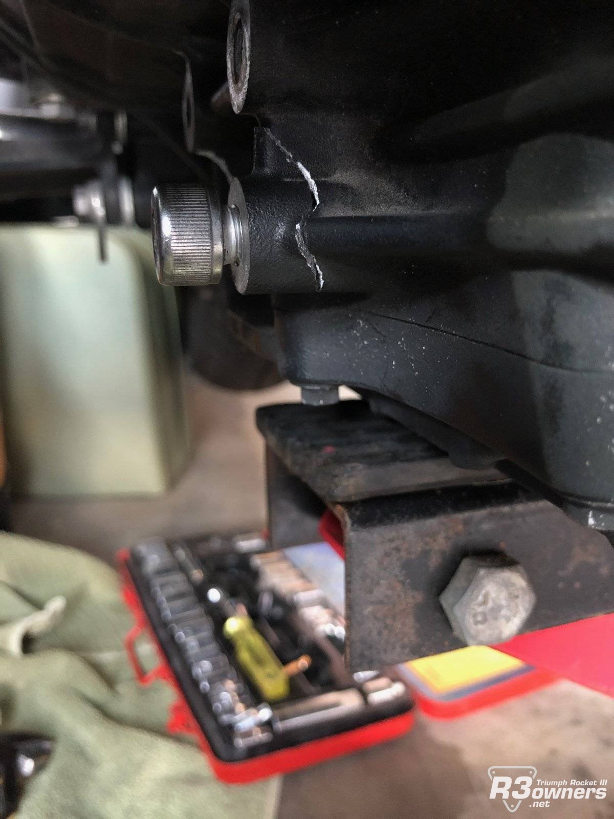 First broken crankcase piece attached with bolt